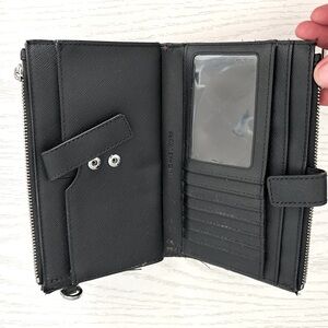 Gently used MK wallet black
